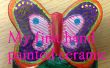 Construire des enfants - main à colorier un papillon en céramique