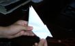 Oiseau qui bat des ailes de papier