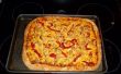 Pizza au poulet parmesan-Ranch avec des poivrons rouges rôtis