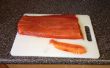Froid fumé saumon avec un fer à souder