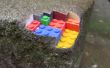 Un bloc de grès, construit à partir de lego, mêlant objets réels avec impressions 3d