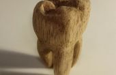 Sculpté en bois dent