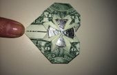 Cœur d’Origami dollar détenant trimestre