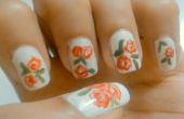 Nail Art tutoriel-rouge fleurs sur base blanche