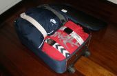 Une valise mieux à l’aide de ceintures