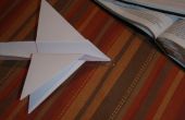 Quatre ailes d’avion en papier