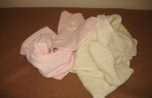 Pliage de serviettes en quarts et tiers