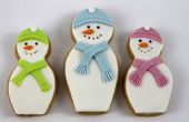 Les cookies de matriochka (poupée de nidification) bonhomme de neige